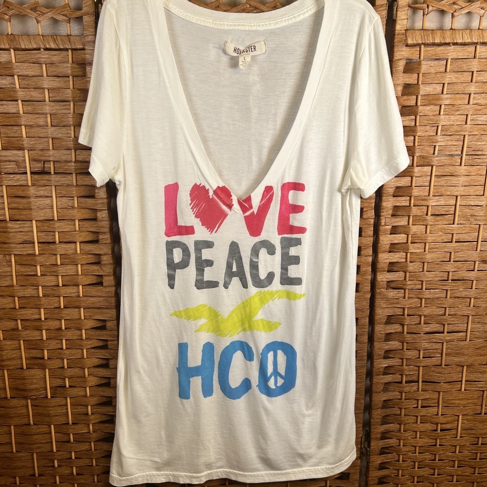 Hollister White V-Neck Tee with Pink, Gray, Yellow & Blue Graphic